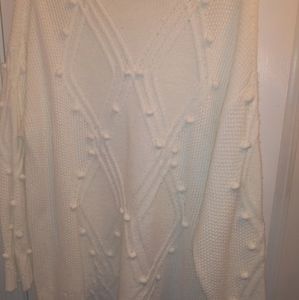 Small pom pom sweater